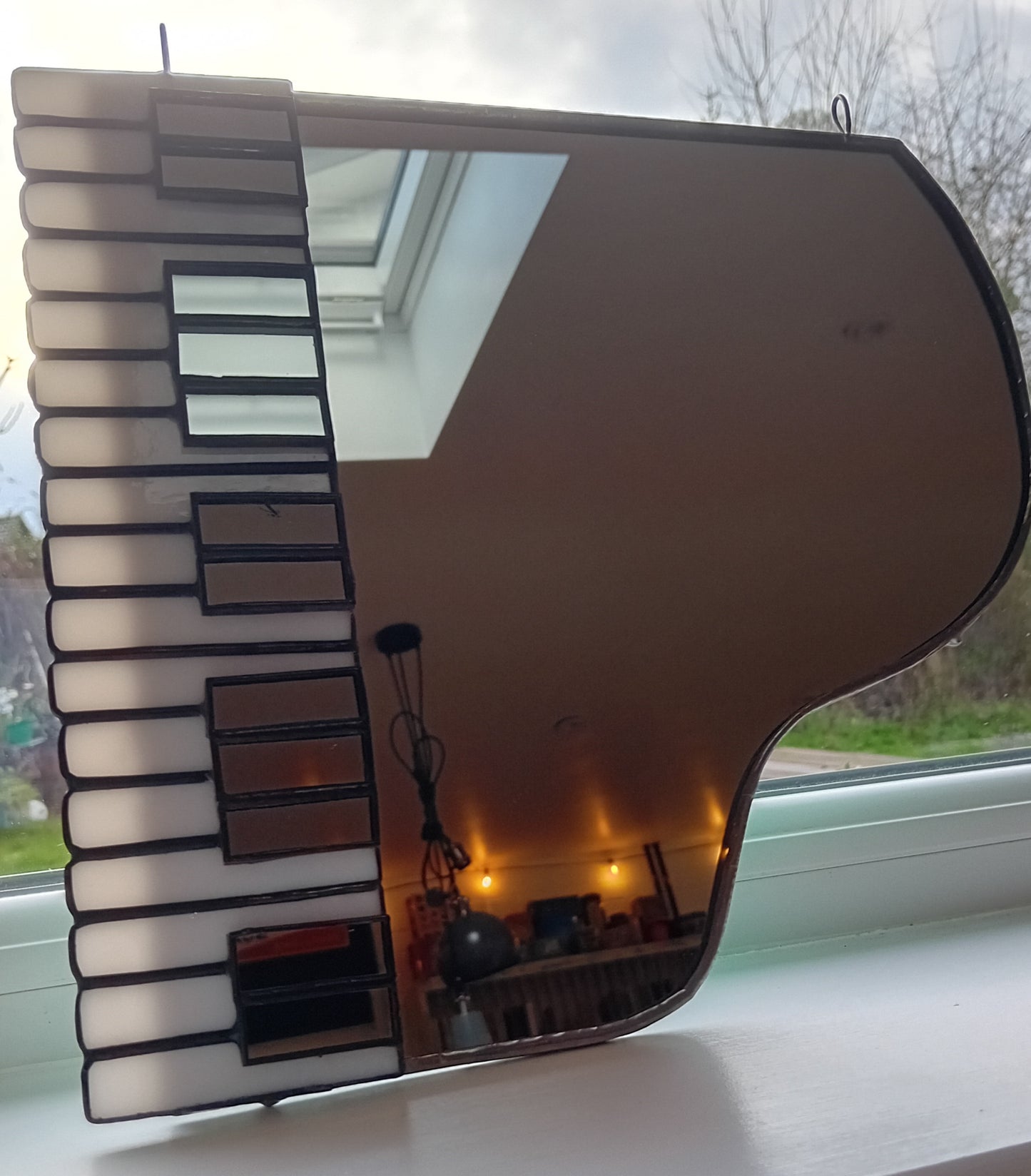 Grand piano mirror
