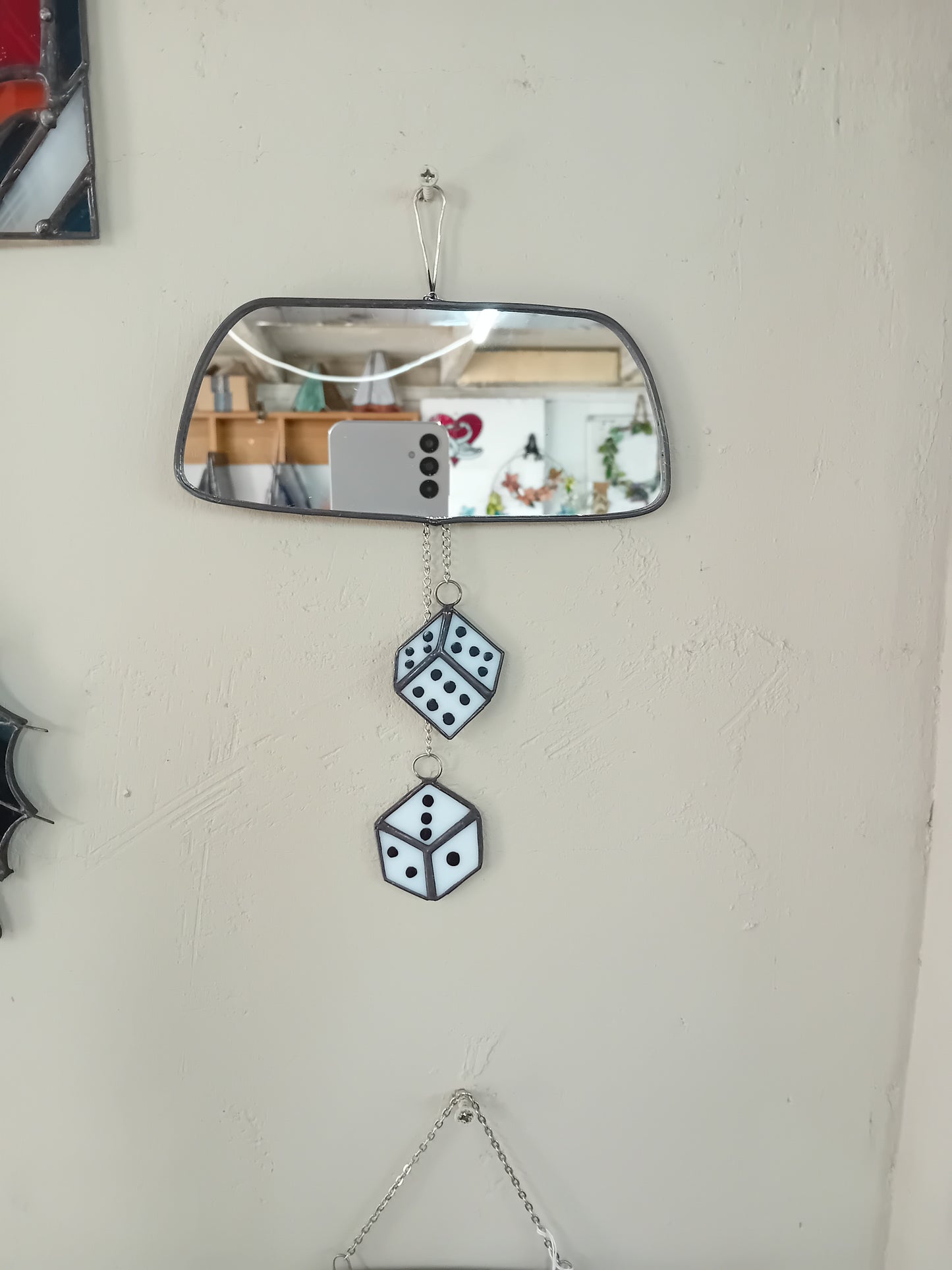 Rear view mirror with dice