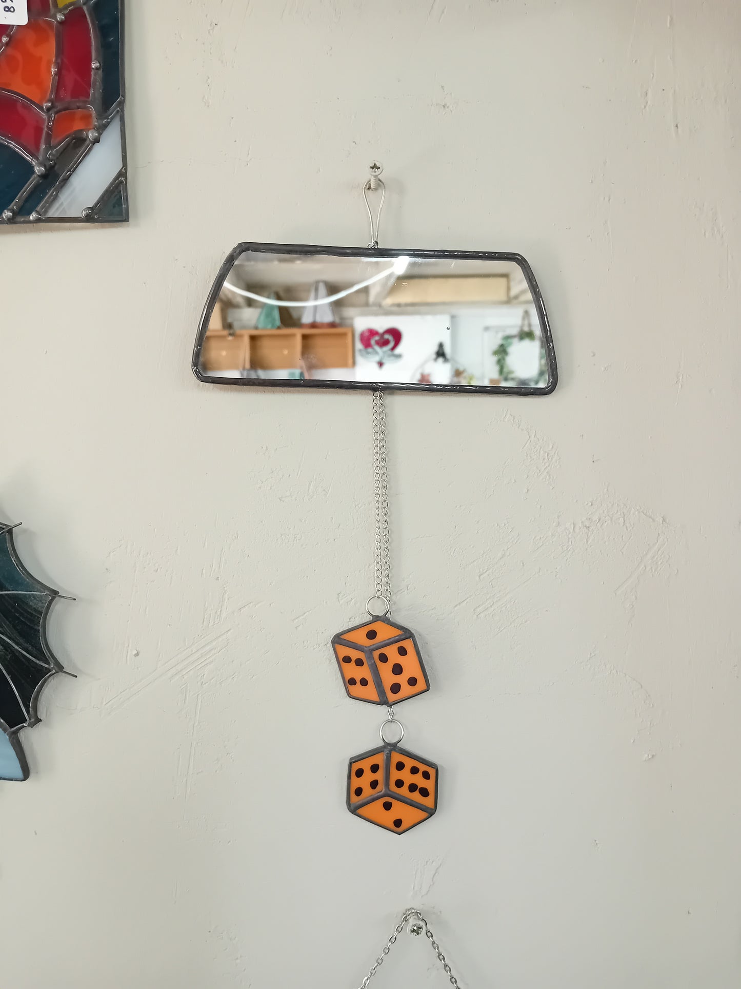 Rear view mirror with dice
