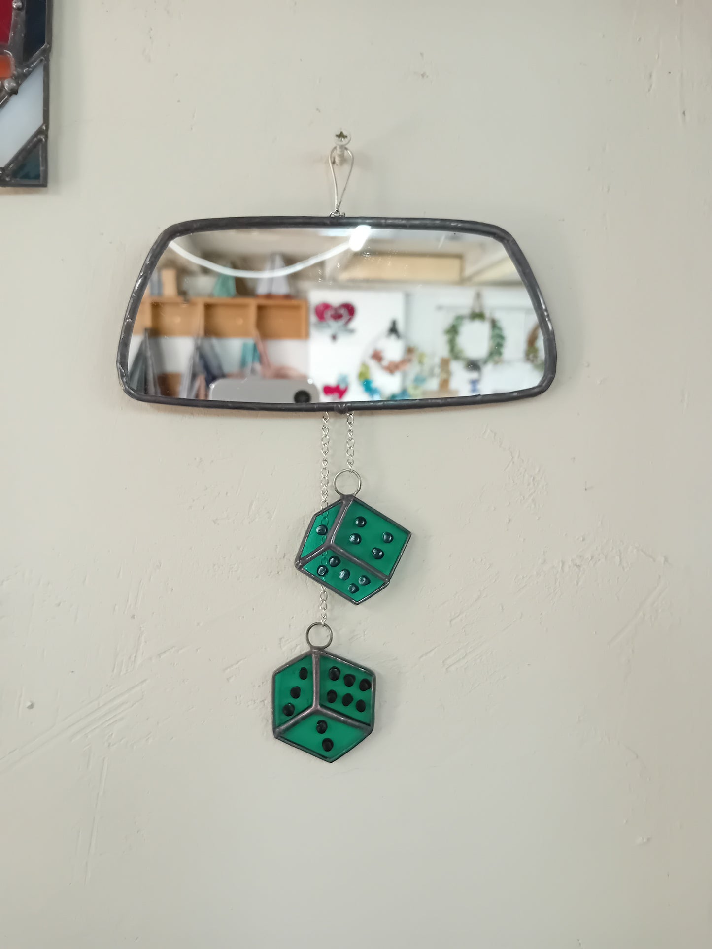 Rear view mirror with dice
